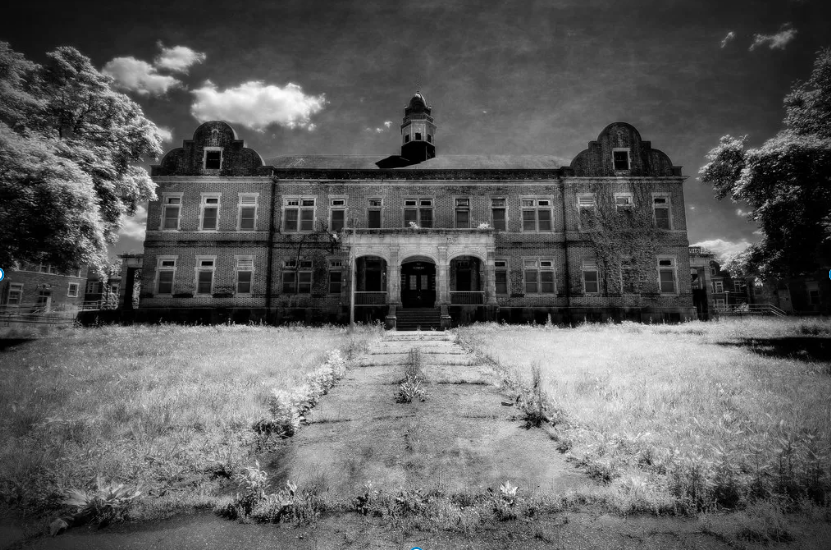 Black and white photo of historic asylum